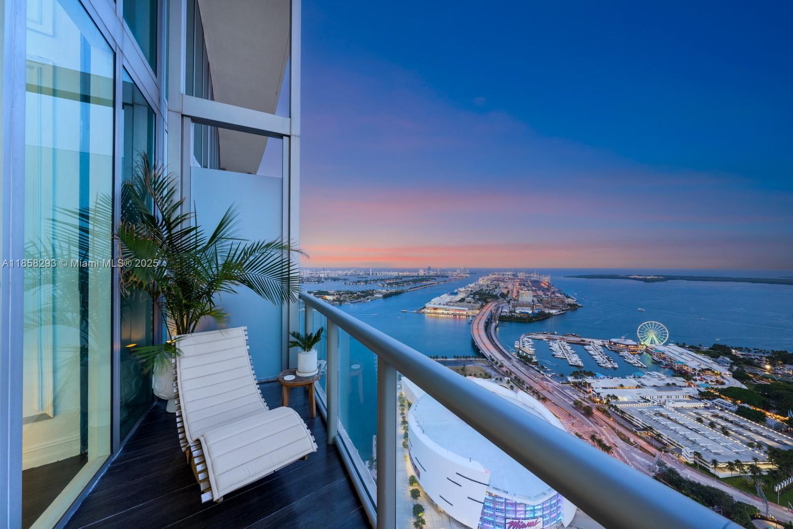 888 Biscayne Boulevard, Unit 5701 Miami, FL 33132 - Photo 32 of 35 a view of balcony with furniture and city view