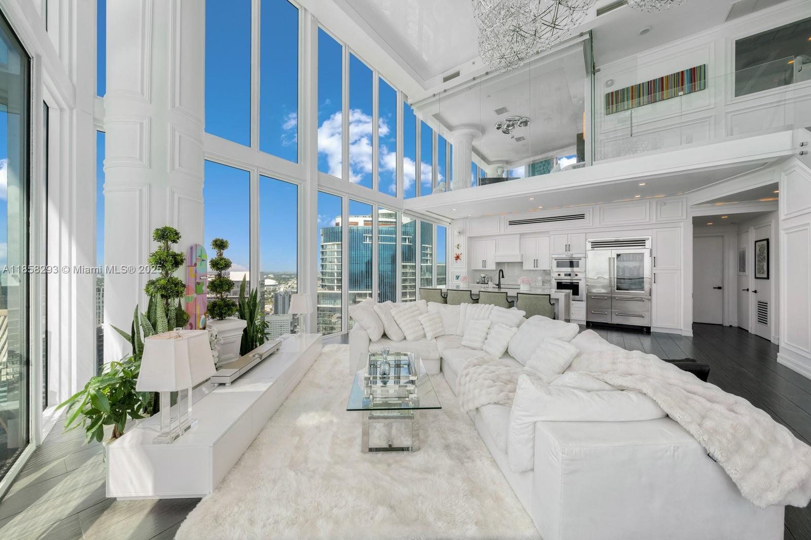 888 Biscayne Boulevard, Unit 5701 Miami, FL 33132 - Photo 6 of 35 a living room with furniture