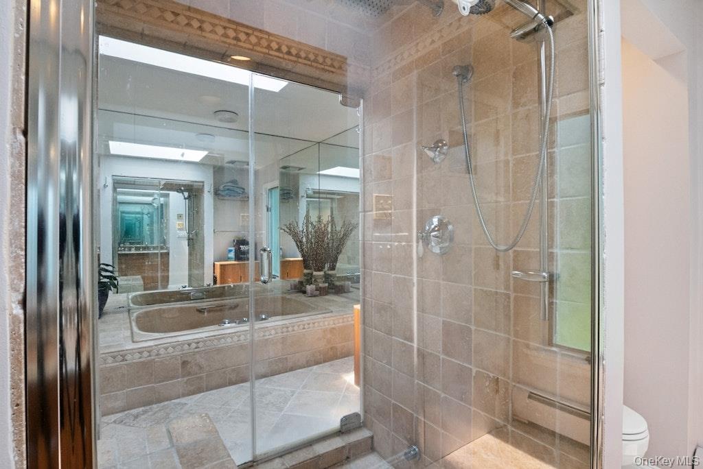 312 Quaker Road Chappaqua, NY 10514 - Photo 23 of 36 a bathroom with a shower