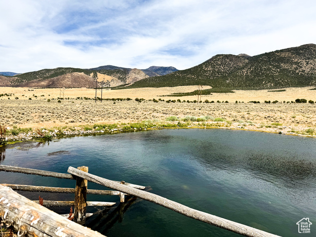 Undisclosed Address Monroe, UT 84754 - Photo 4 of 39 Dock with a pond and mountain view