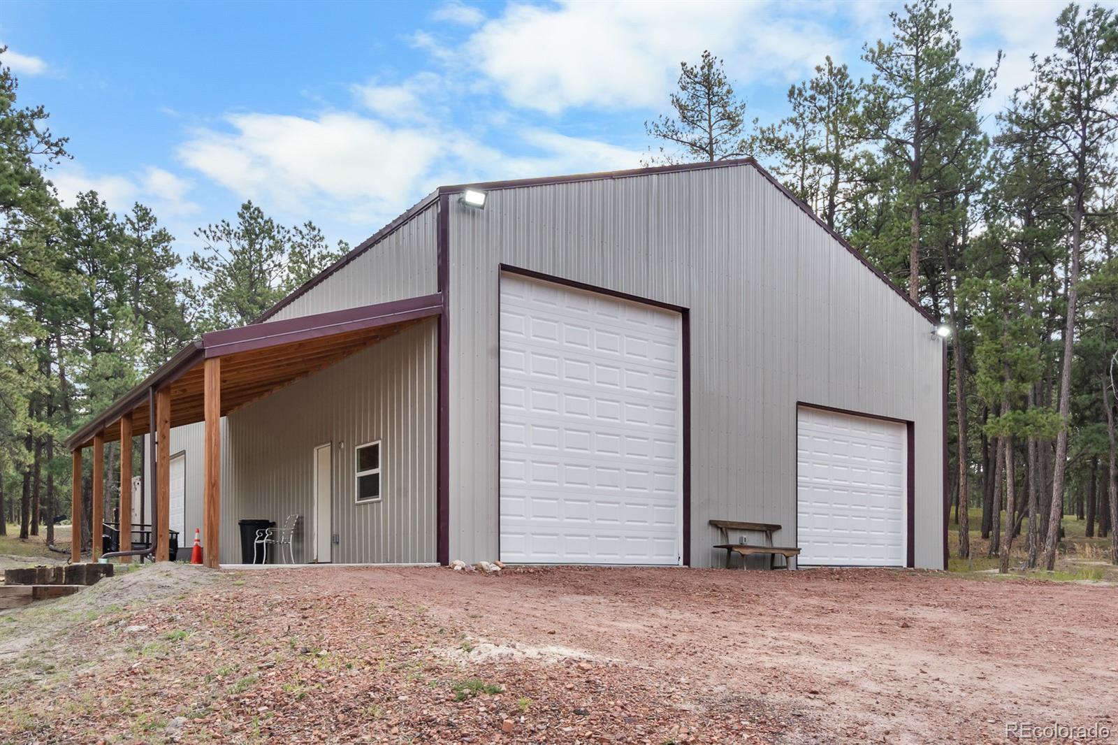 11374 Ridgewood Way Kiowa, CO 80117 - Photo 3 of 49 a house with a outdoor space
