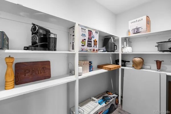 a view of workspace with cabinets
