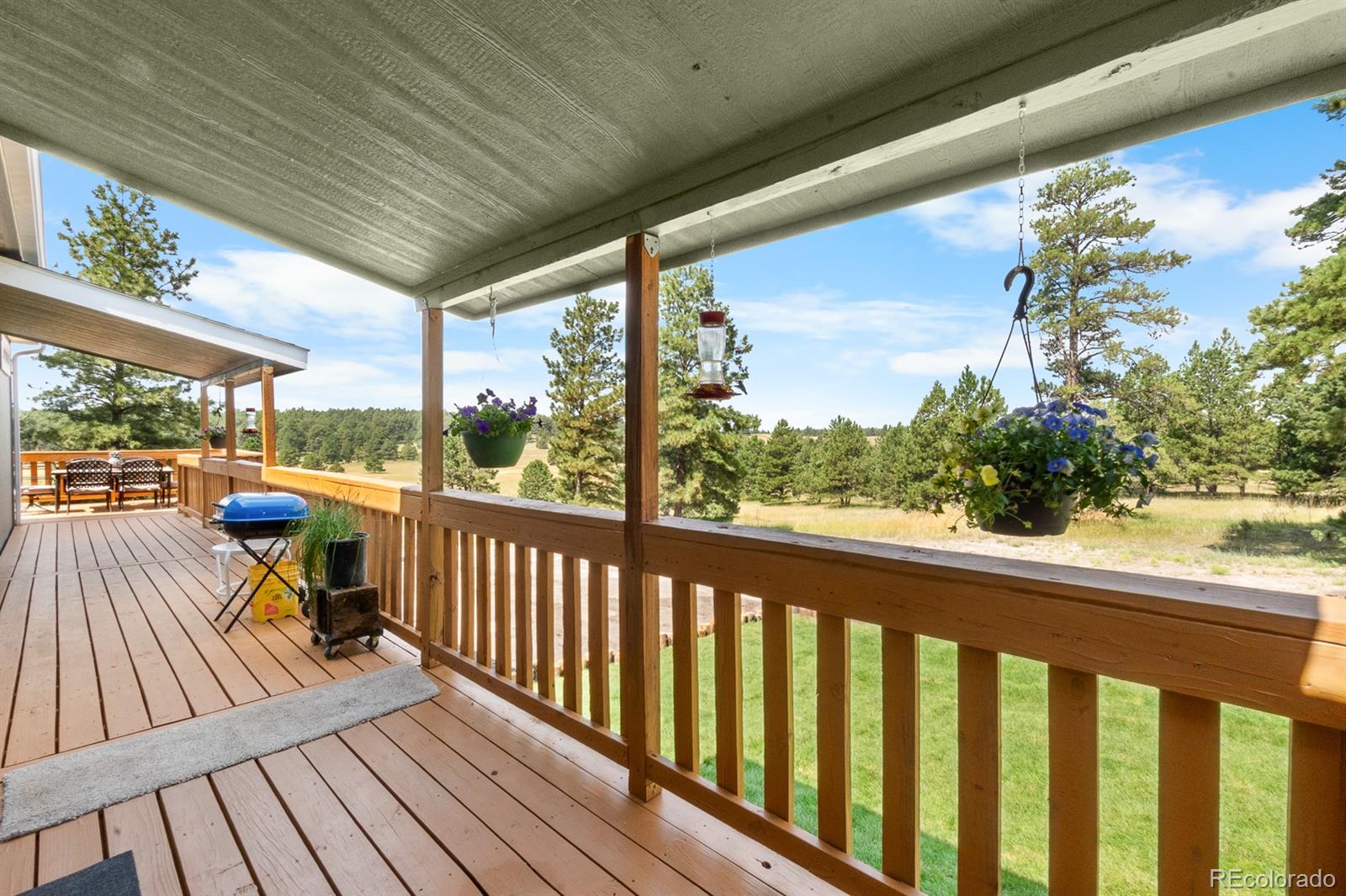 11374 Ridgewood Way Kiowa, CO 80117 - Photo 38 of 49 a view of balcony with wooden floor