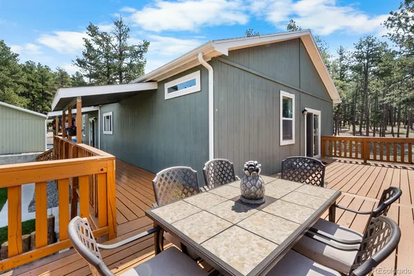 a view of a patio on the deck