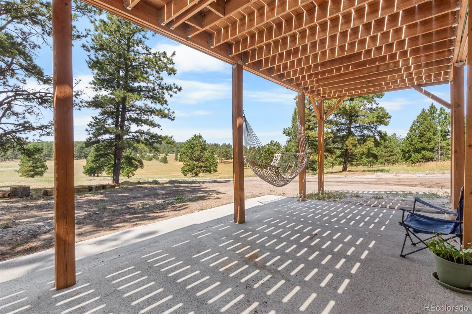 11374 Ridgewood Way Kiowa, CO 80117 - Photo 41 of 49 a view of a yard with wooden fence