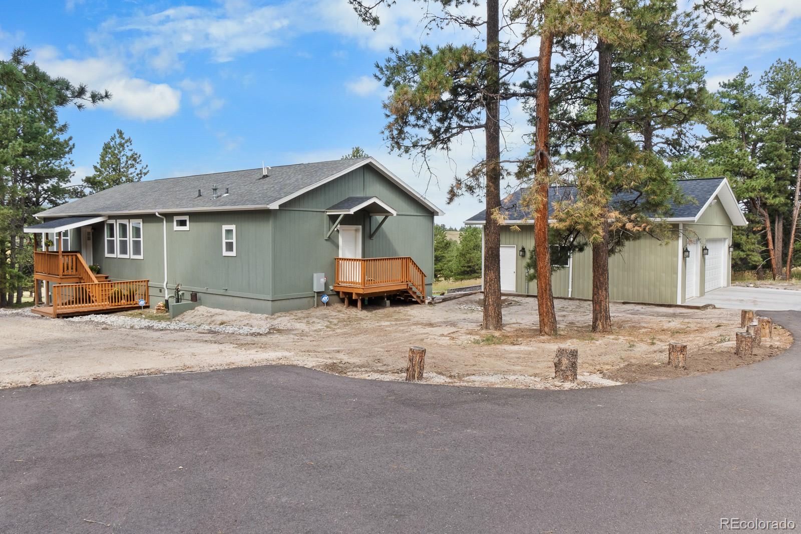 11374 Ridgewood Way Kiowa, CO 80117 - Photo 44 of 49 a house with a outdoor space