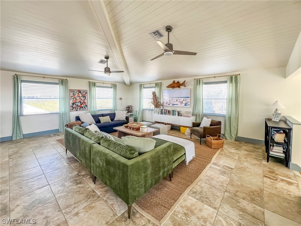 4480 Panama Shell Drive Upper Captiva, FL 33924 - Photo 17 of 50 a living room with furniture and a window