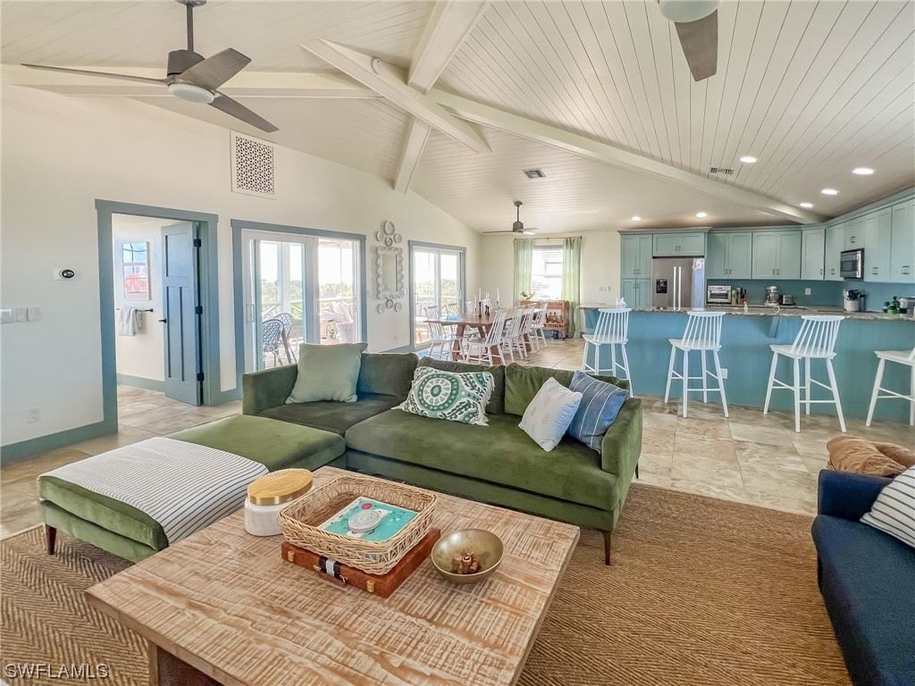 4480 Panama Shell Drive Upper Captiva, FL 33924 - Photo 22 of 50 a living room with furniture and a table