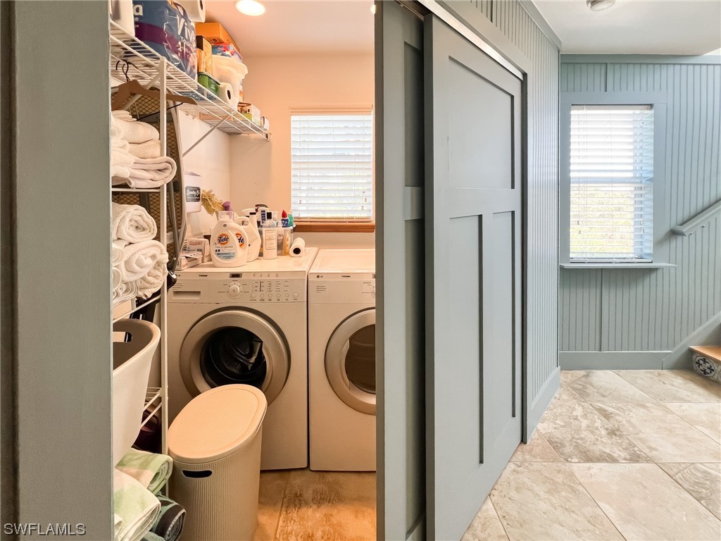 4480 Panama Shell Drive Upper Captiva, FL 33924 - Photo 37 of 50 a view of a bedroom with washer and dryer