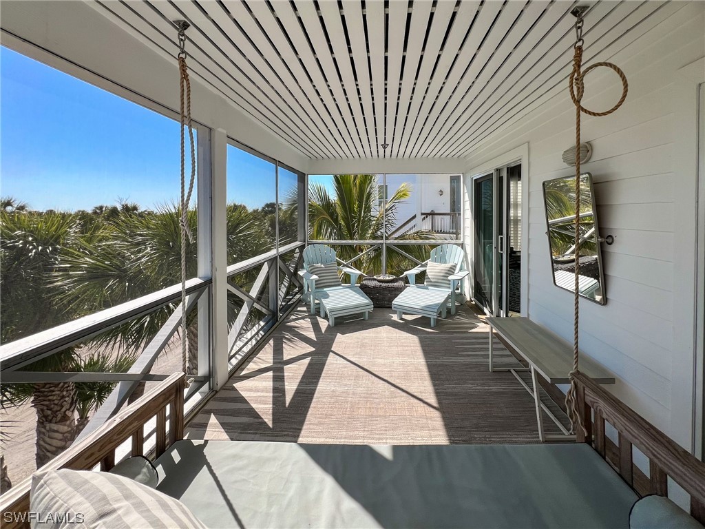 4480 Panama Shell Drive Upper Captiva, FL 33924 - Photo 41 of 50 a view of a couches and dinning table in the balcony