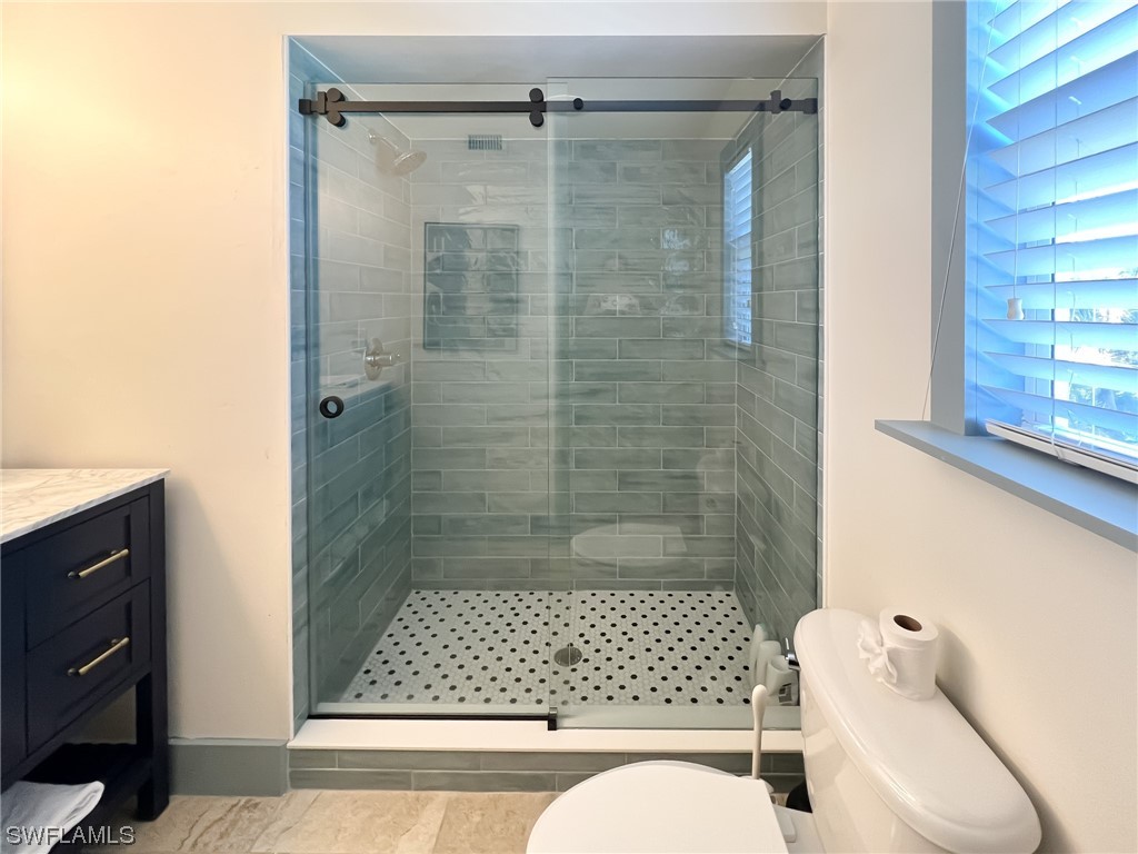 4480 Panama Shell Drive Upper Captiva, FL 33924 - Photo 47 of 50 a bathroom with a bathtub and shower