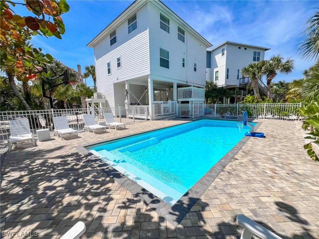 4480 Panama Shell Drive Upper Captiva, FL 33924 - Photo 50 of 50 a view of a house with swimming pool