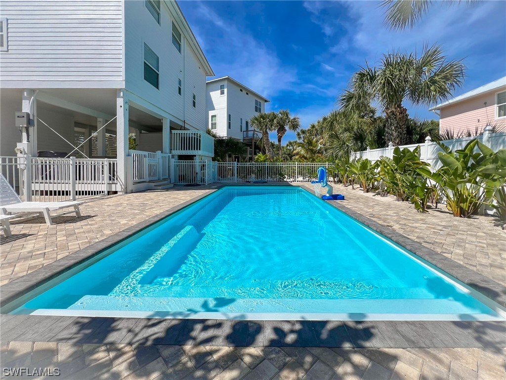 4480 Panama Shell Drive Upper Captiva, FL 33924 - Photo 10 of 50 a view of a house with swimming pool