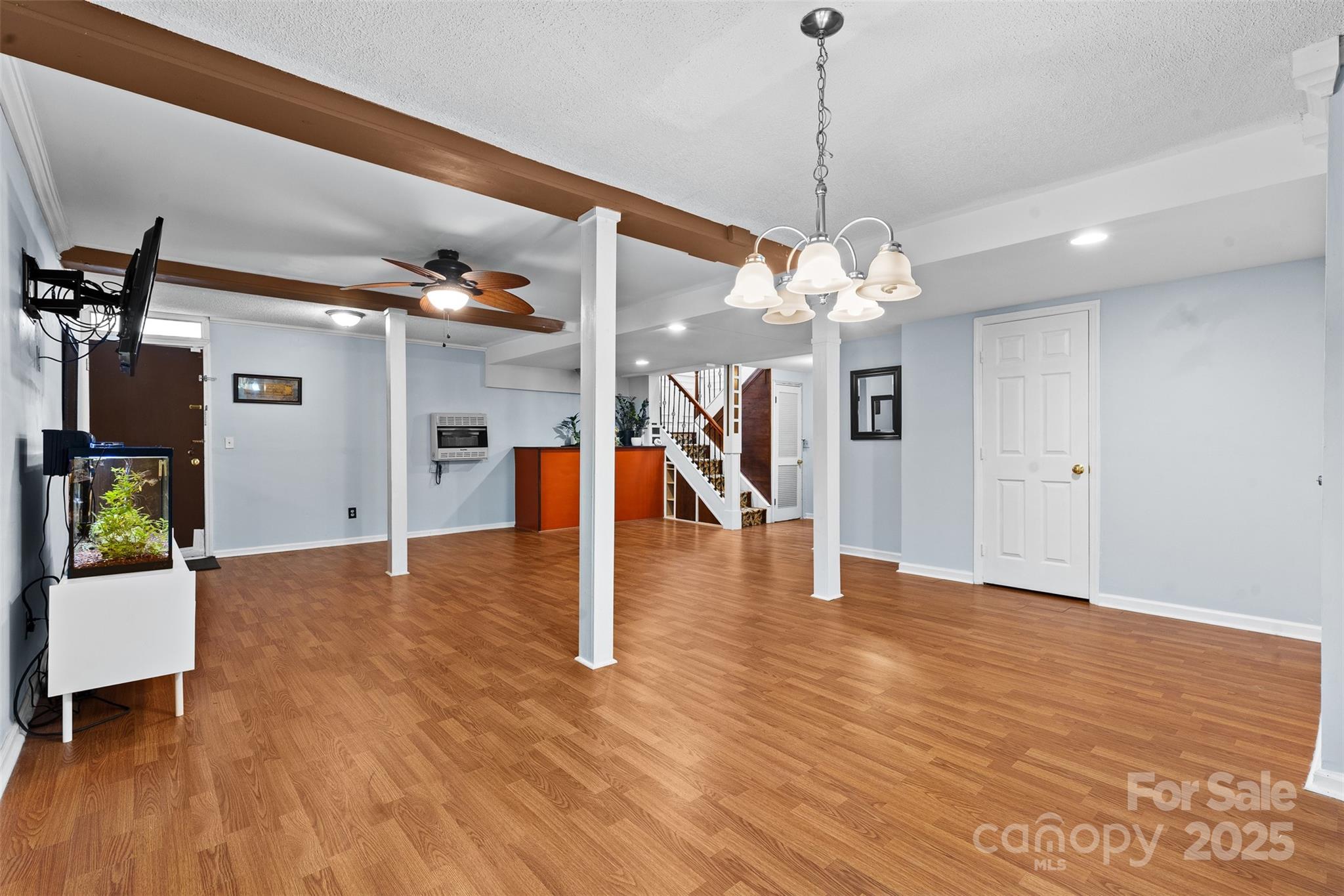 6221 Thermal Road Charlotte, NC 28211 - Photo 25 of 36 a view of a room with wooden floor garage and a window