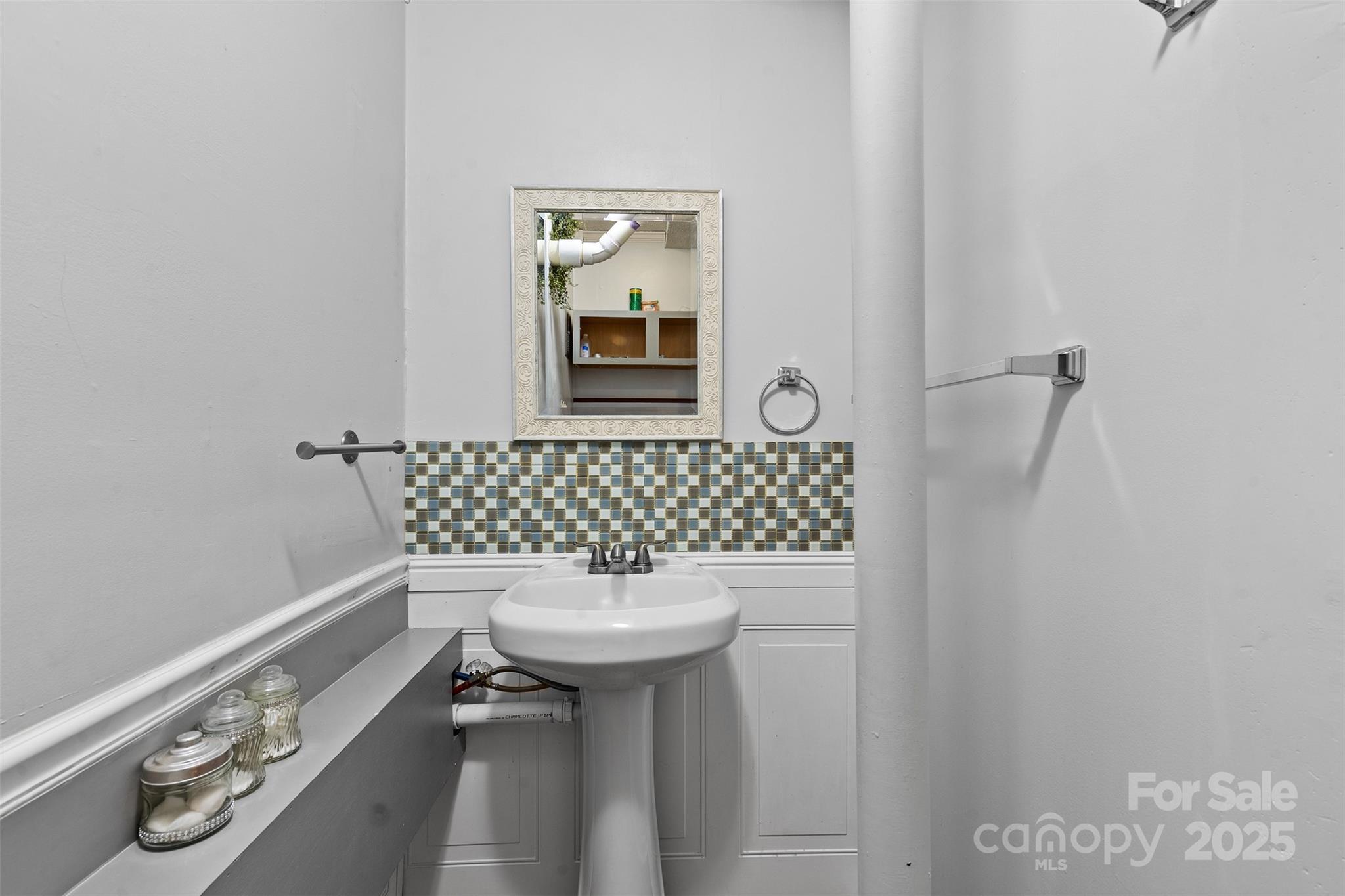 6221 Thermal Road Charlotte, NC 28211 - Photo 28 of 36 a bathroom with a sink and a toilet