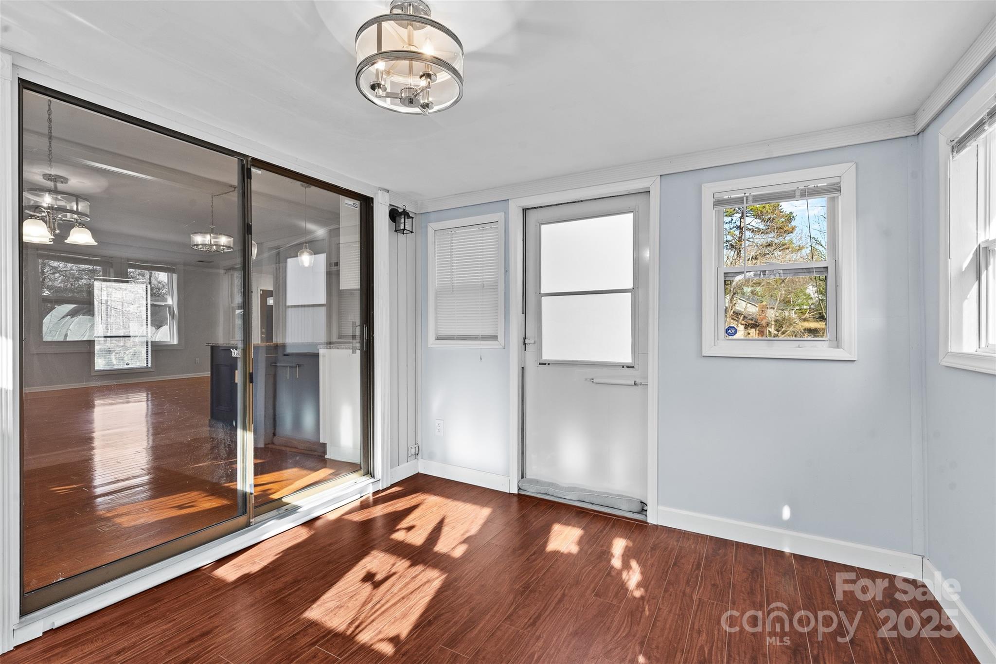 6221 Thermal Road Charlotte, NC 28211 - Photo 30 of 36 a view of an empty room with wooden floor and a window