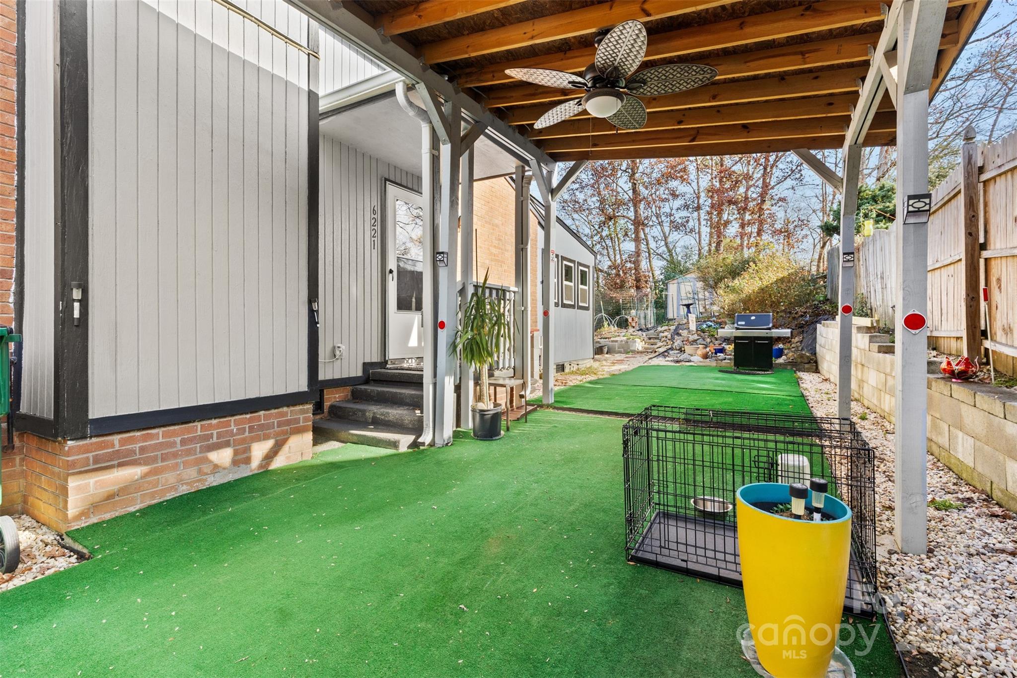 6221 Thermal Road Charlotte, NC 28211 - Photo 31 of 36 a view of a backyard with a garden and plants