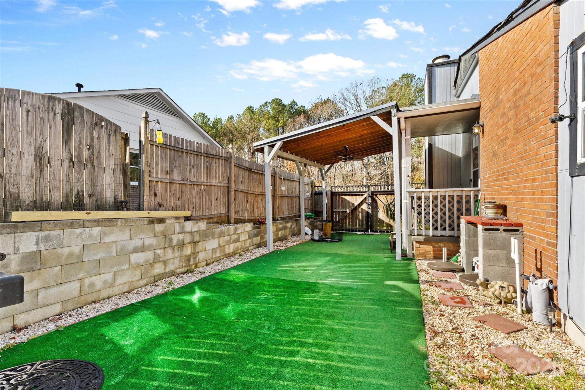 6221 Thermal Road Charlotte, NC 28211 - Photo 32 of 36 a view of a house with a yard