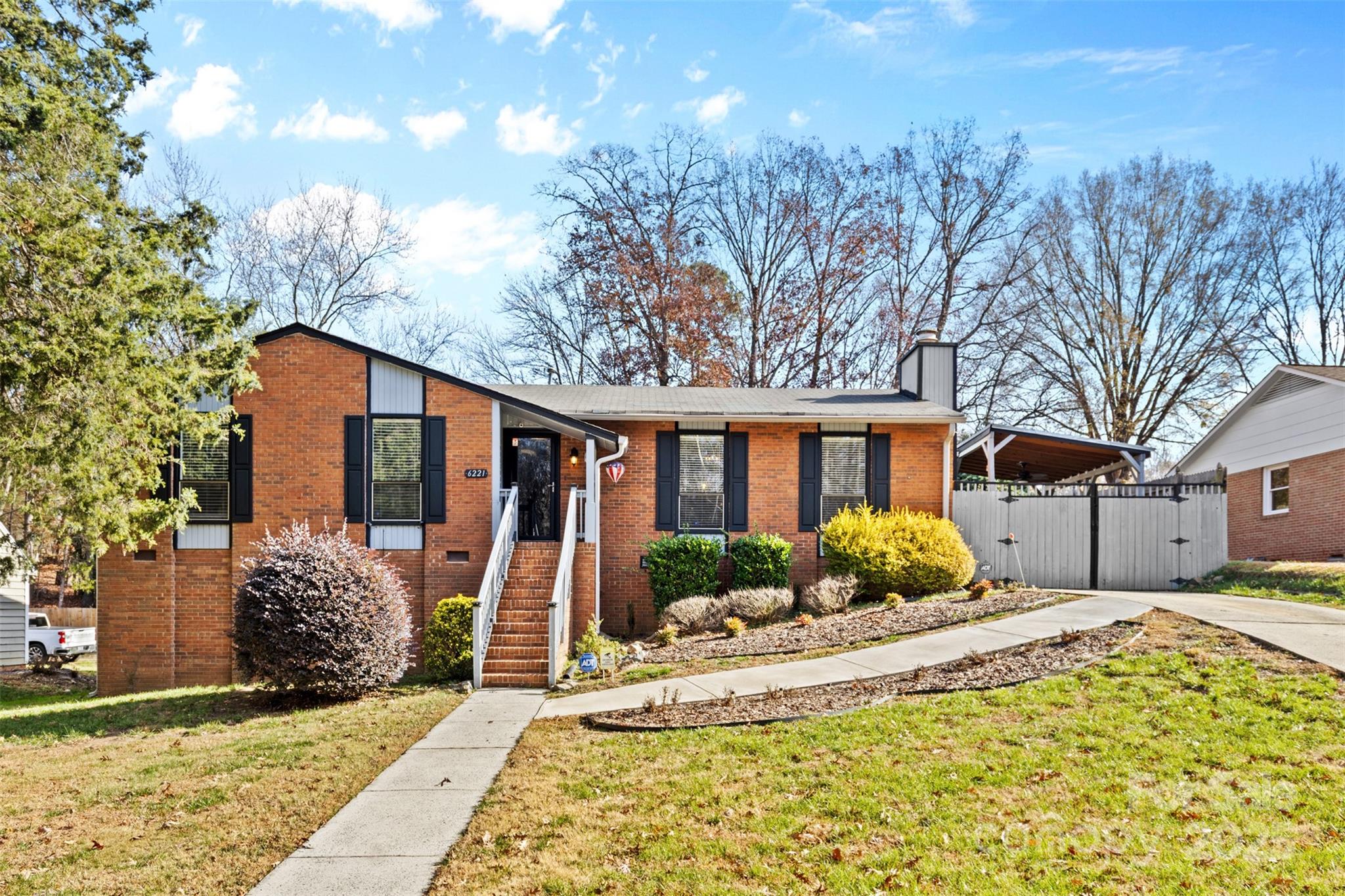 6221 Thermal Road Charlotte, NC 28211 - Photo 35 of 36 a front view of a house with a yard