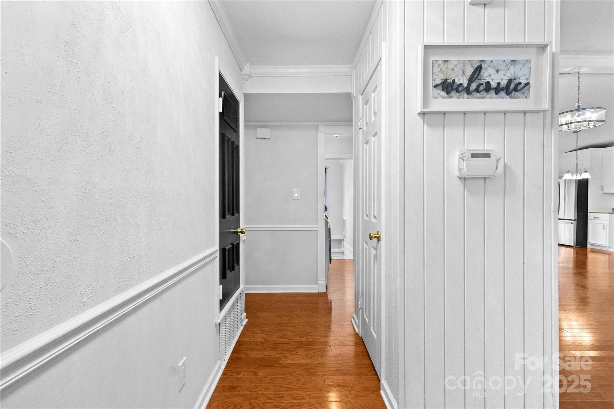 6221 Thermal Road Charlotte, NC 28211 - Photo 4 of 36 a view of a hallway with wooden floor