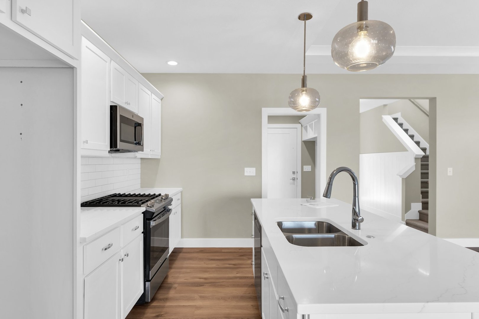 4518 Legends Drive Champaign, IL 61822 - Photo 14 of 44 a kitchen with a sink and stove