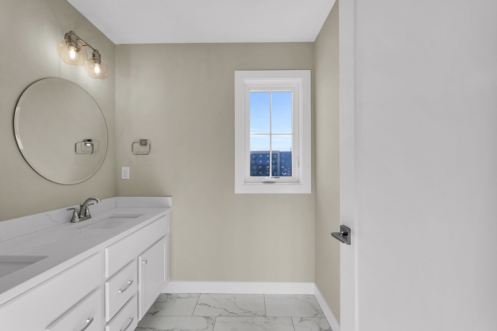 4518 Legends Drive Champaign, IL 61822 - Photo 20 of 44 a bathroom with a sink and a mirror