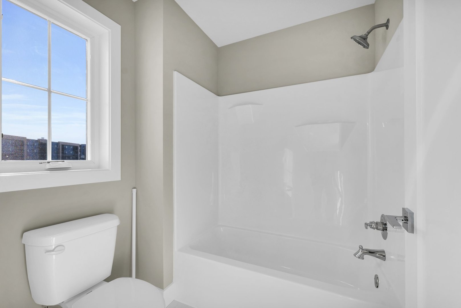 4518 Legends Drive Champaign, IL 61822 - Photo 21 of 44 a bathroom with a toilet and bathtub