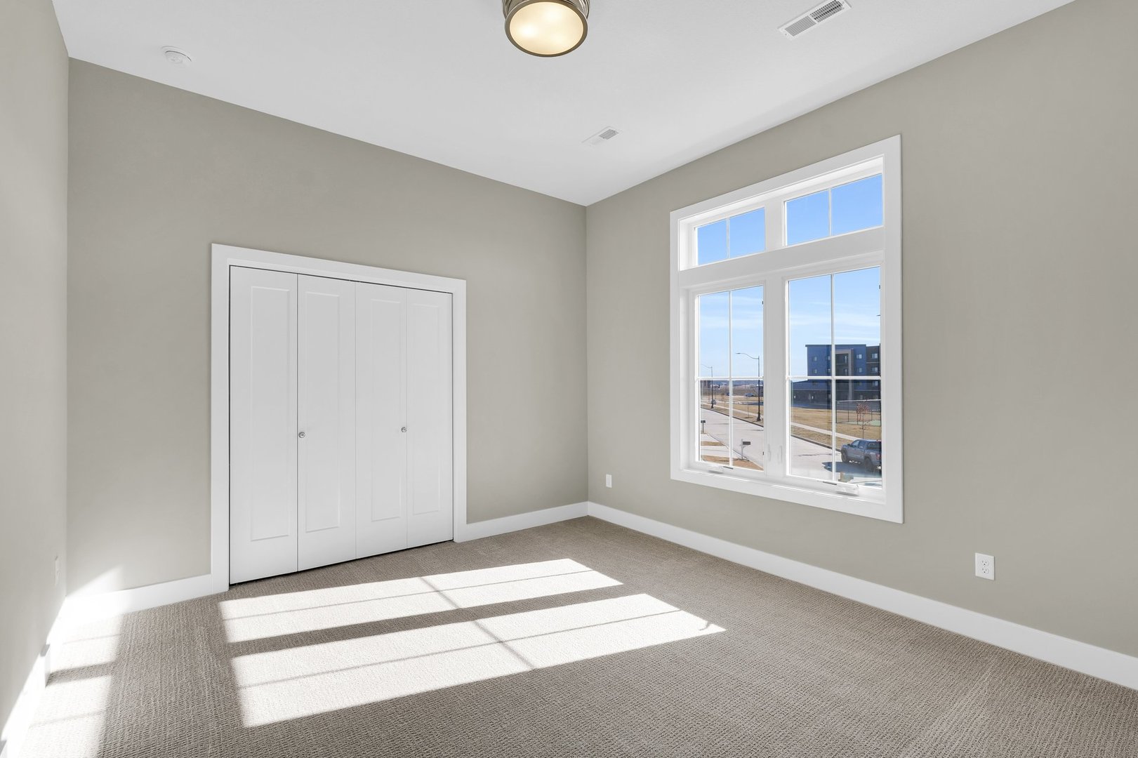 4518 Legends Drive Champaign, IL 61822 - Photo 22 of 44 a view of an empty room with a window