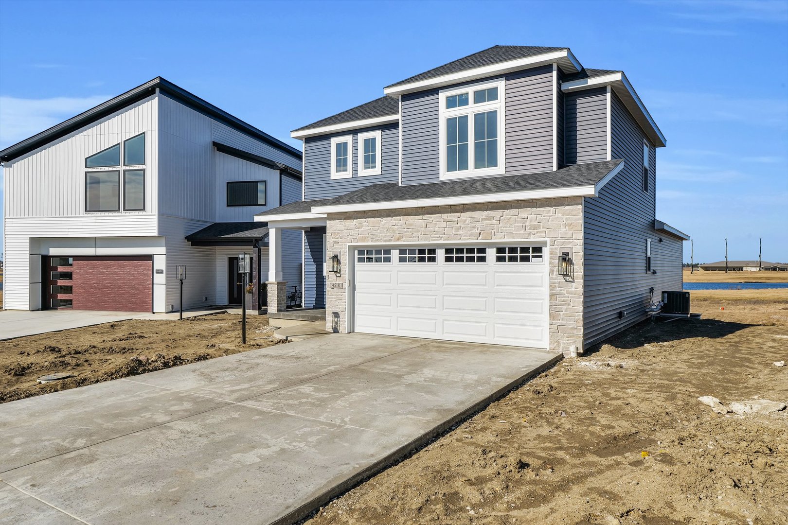 4518 Legends Drive Champaign, IL 61822 - Photo 3 of 44 a front view of a house with a yard