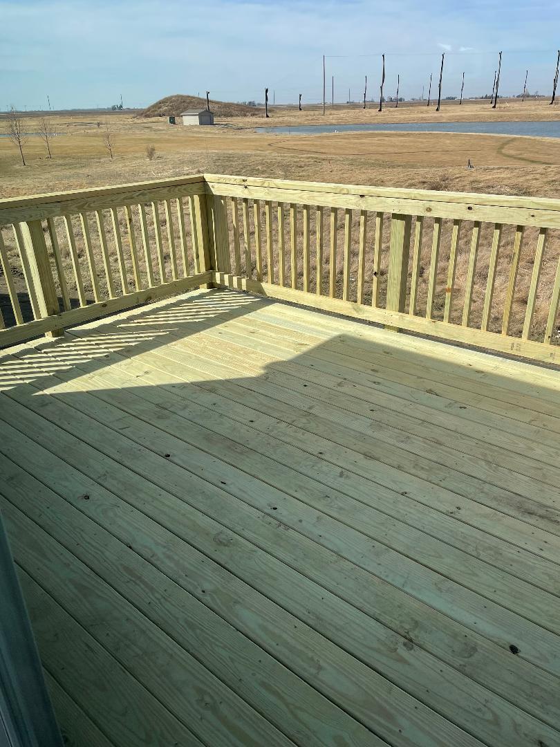 4518 Legends Drive Champaign, IL 61822 - Photo 40 of 44 a view of a balcony with an ocean view