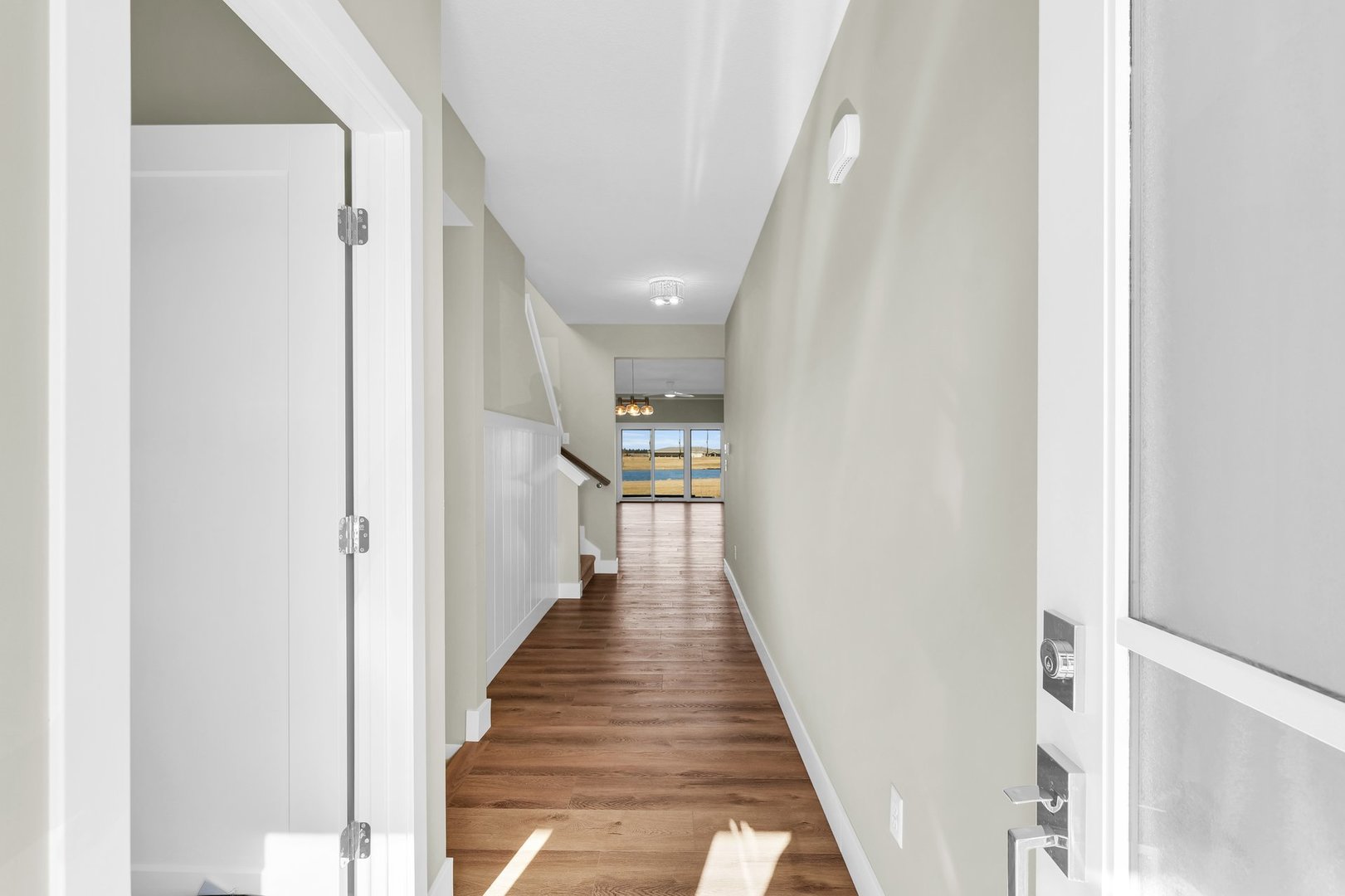 4518 Legends Drive Champaign, IL 61822 - Photo 5 of 44 a view of a hallway with wooden floor