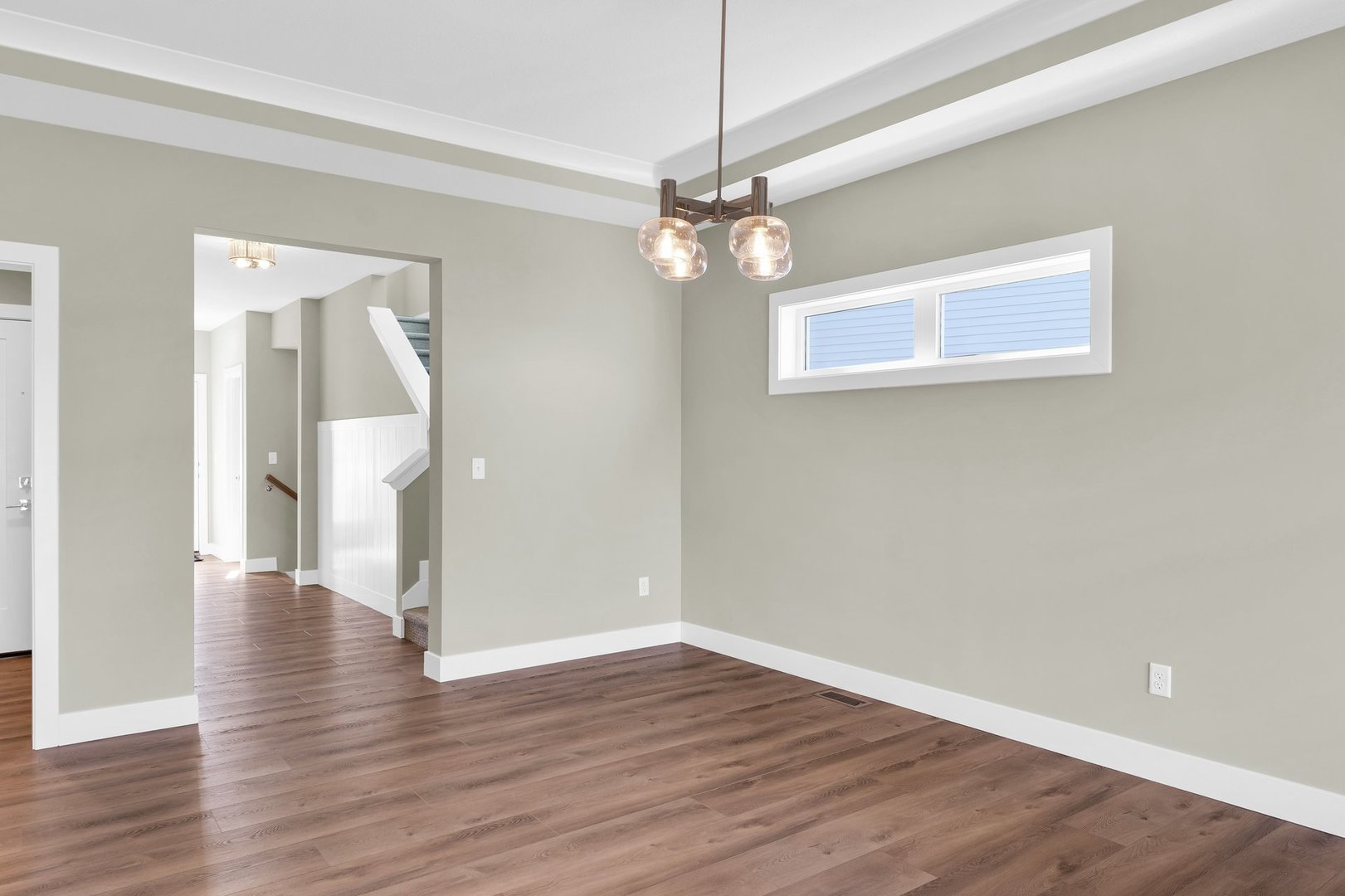 4518 Legends Drive Champaign, IL 61822 - Photo 9 of 44 a view of an empty room with wooden floor
