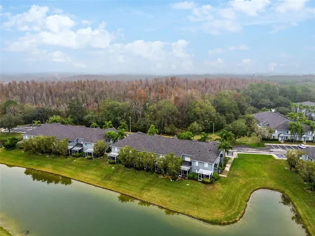 a view of a swimming pool with a lounge chair