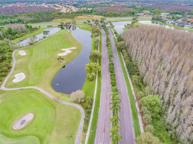 a view of a house with backyard porch and hall