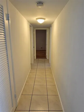 a view of hallway with shower