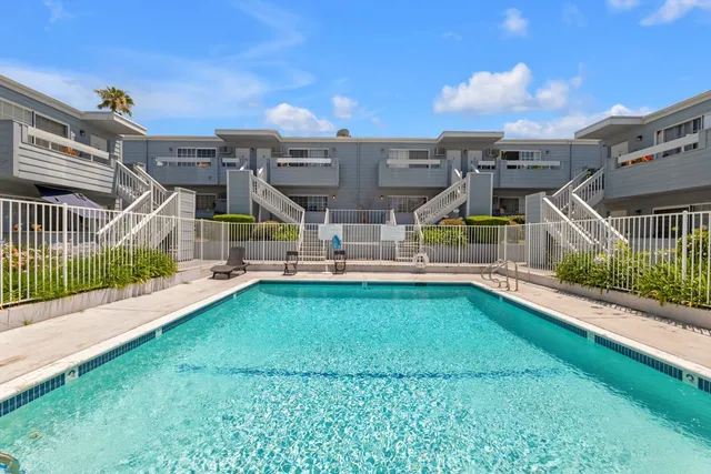 a view of a house with swimming pool