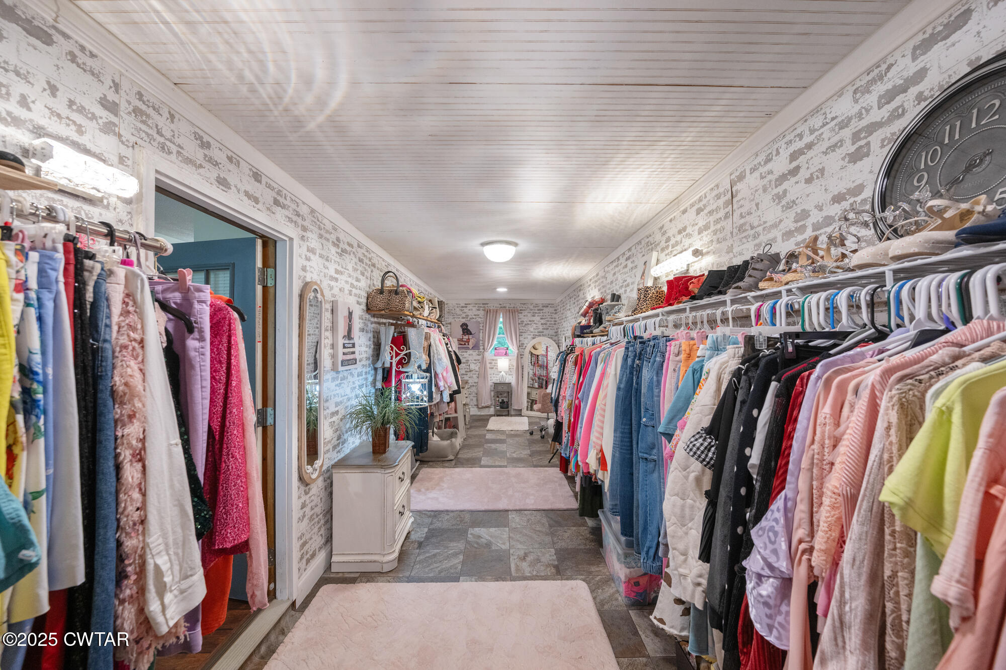 1401 Camper Road Decaturville, TN 38329 - Photo 24 of 40 a view of walk in closet with clothes
