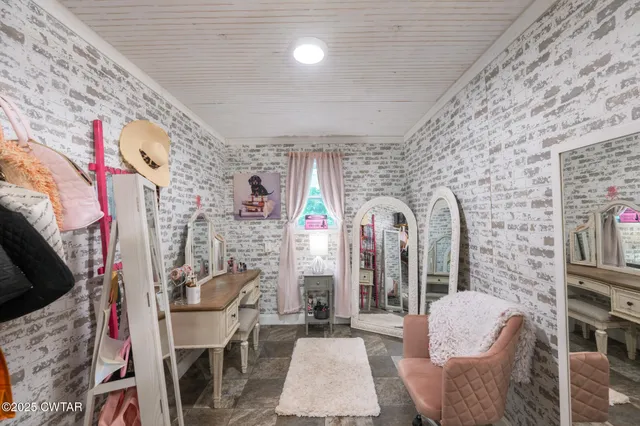 a view of a storage room with a white door