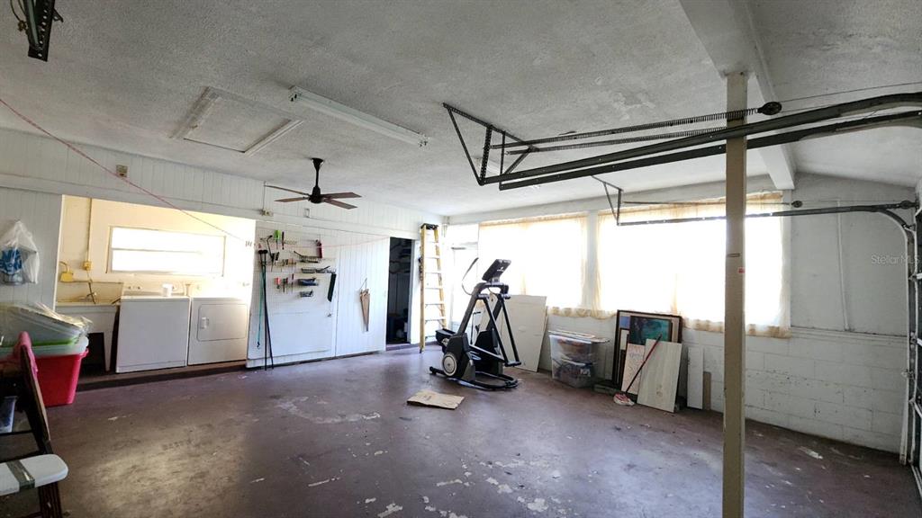2405 Neptune Road Kissimmee, FL 34744 - Photo 9 of 17 a view of a room with gym equipment