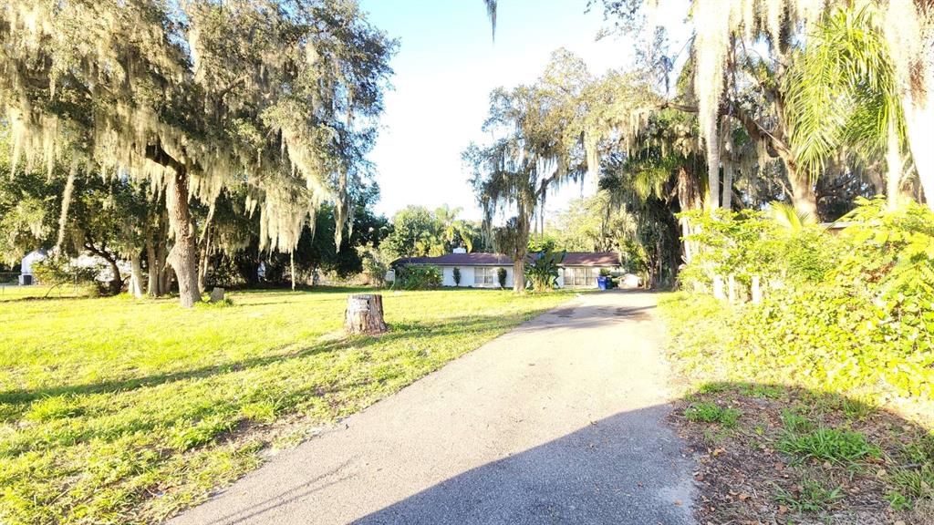 2405 Neptune Road Kissimmee, FL 34744 - Photo 10 of 17 a view of yard with swimming pool