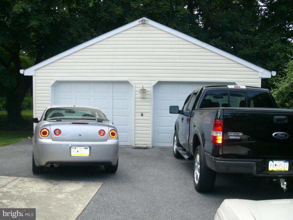 204 North Elm Street Lititz, PA 17543 - Photo 2 of 11 a car parked in front of white house