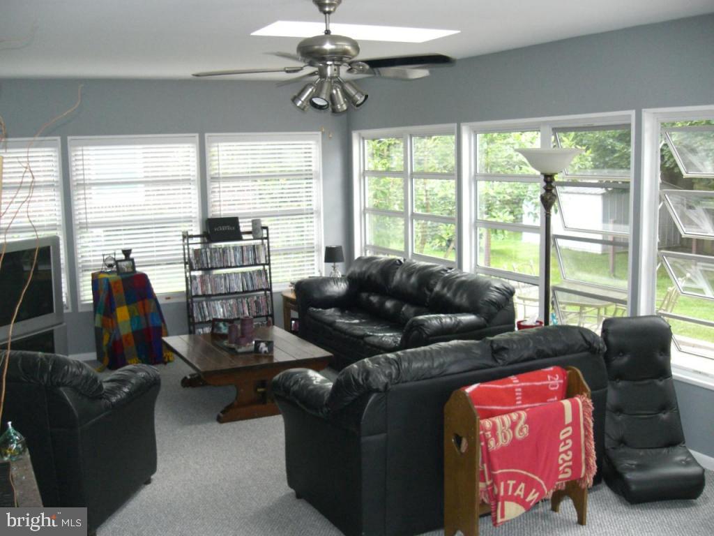 204 North Elm Street Lititz, PA 17543 - Photo 5 of 11 a living room with furniture and floor to ceiling windows