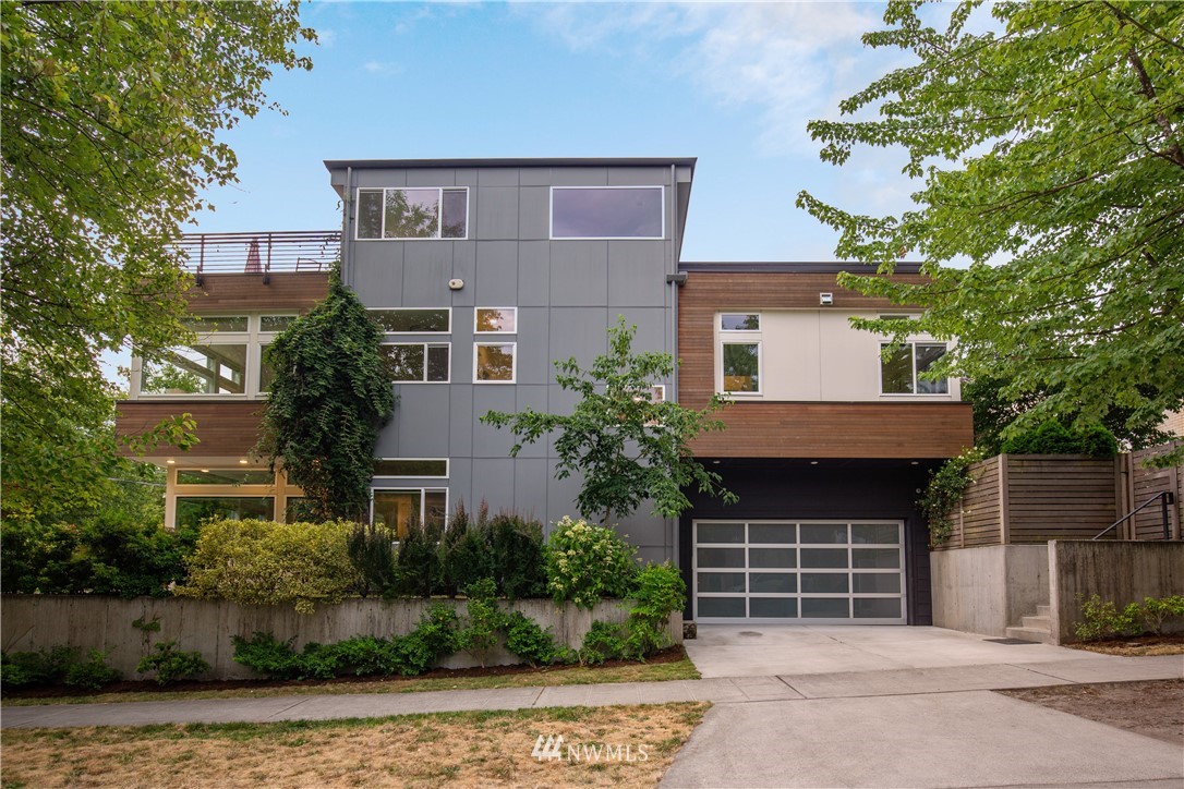 3217 East Spring Street Seattle, WA 98122 - Photo 33 of 33 a front view of a house with a yard