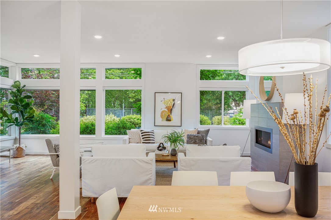 3217 East Spring Street Seattle, WA 98122 - Photo 10 of 33 a living room with furniture and a large window