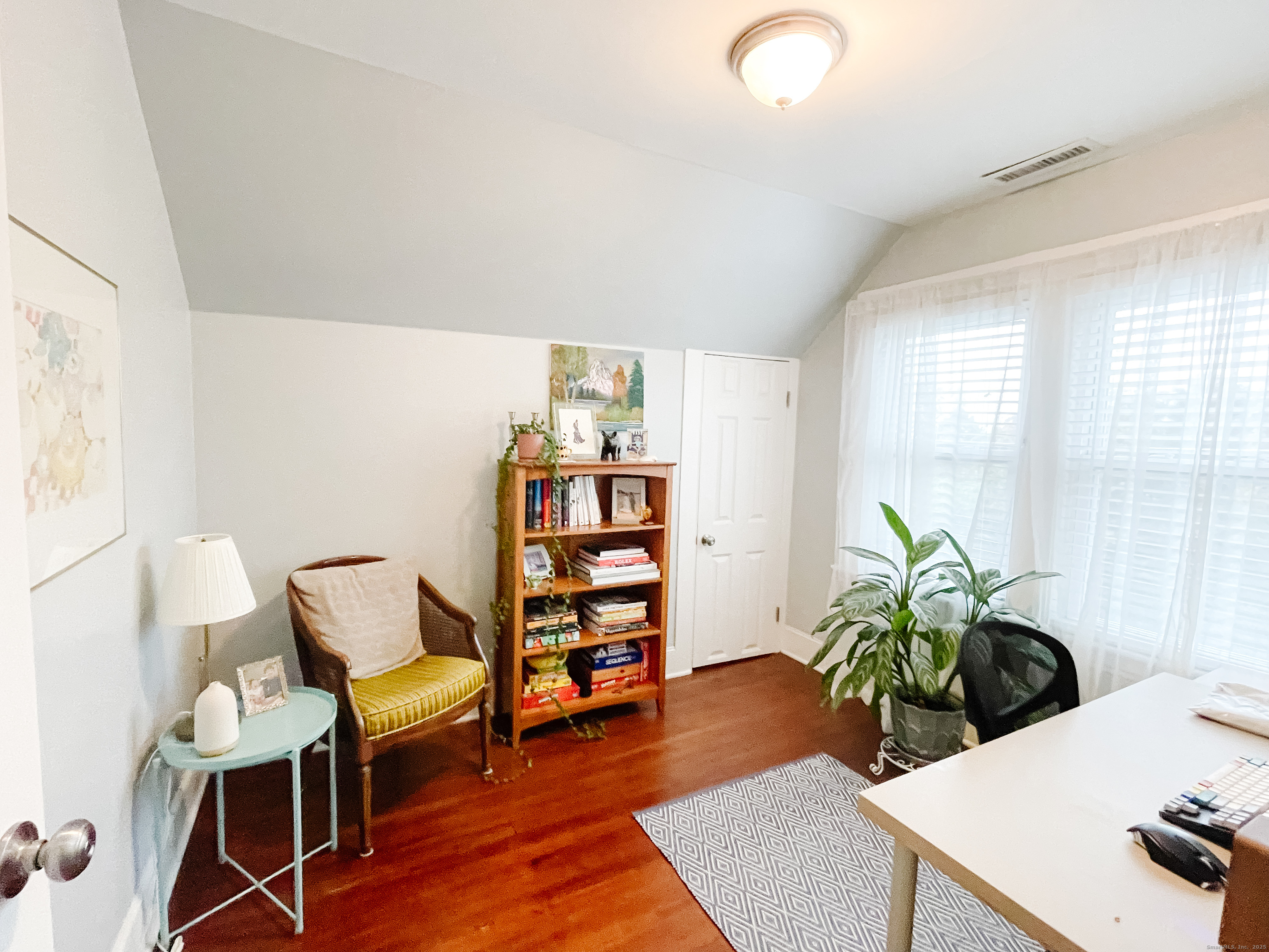 46 Riverside Drive Fairfield, CT 06824 - Photo 16 of 20 a living room with furniture and wooden floor