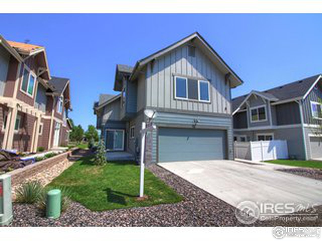 304 West Maple Street Superior, CO 80027 - Photo 6 of 16 a front view of a house with a yard