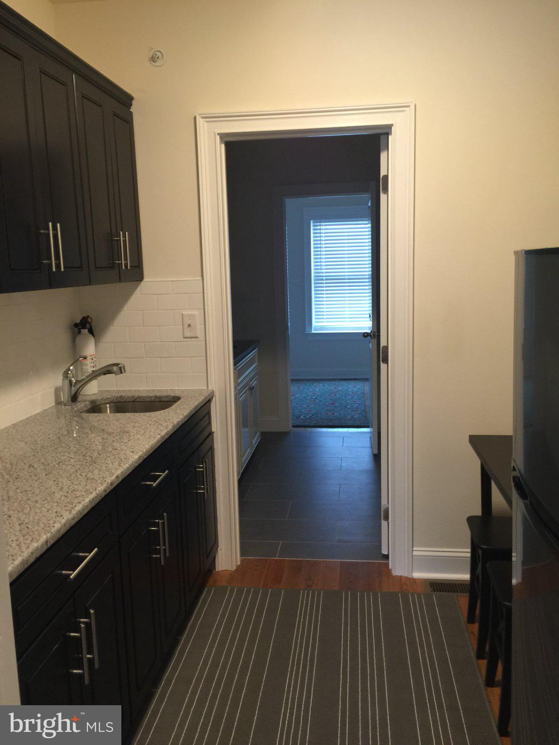 4080 Spring Garden Street Philadelphia, PA 19104 - Photo 5 of 28 Charming kitchen with inviting entryway.
