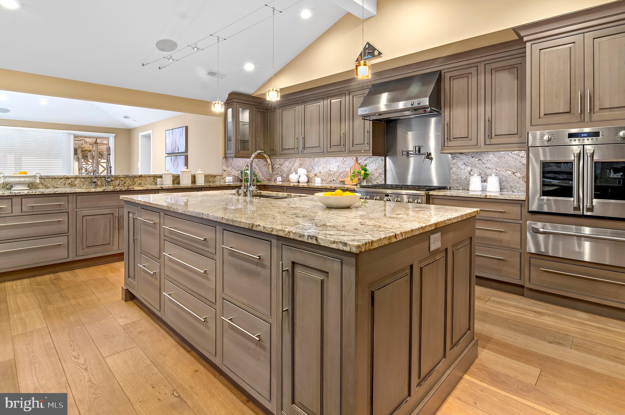 3521 Old Court Road Baltimore, MD 21208 - Photo 12 of 39 a kitchen with a sink stove and cabinets