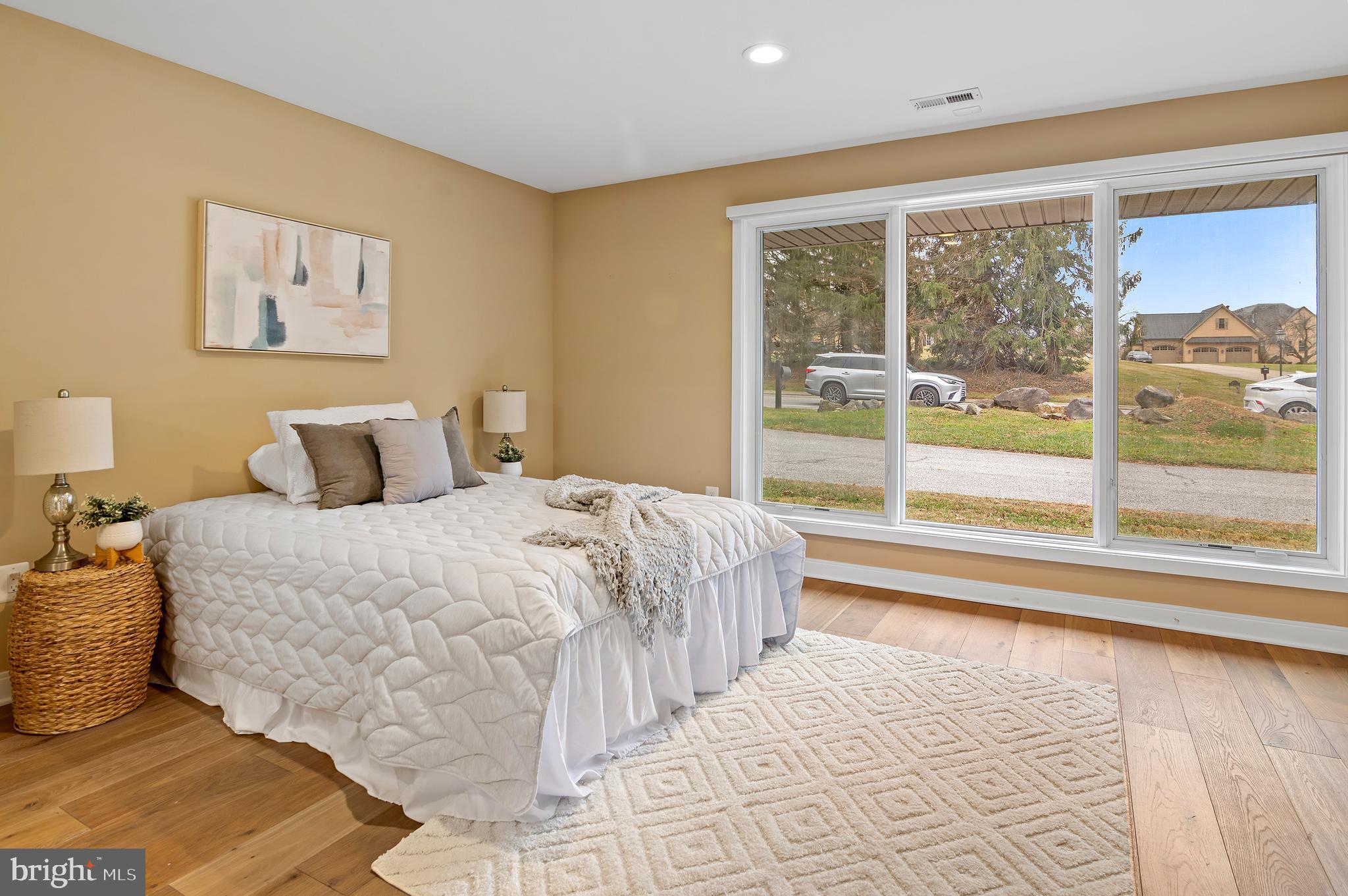 3521 Old Court Road Baltimore, MD 21208 - Photo 23 of 39 a bedroom with a large bed and a large window