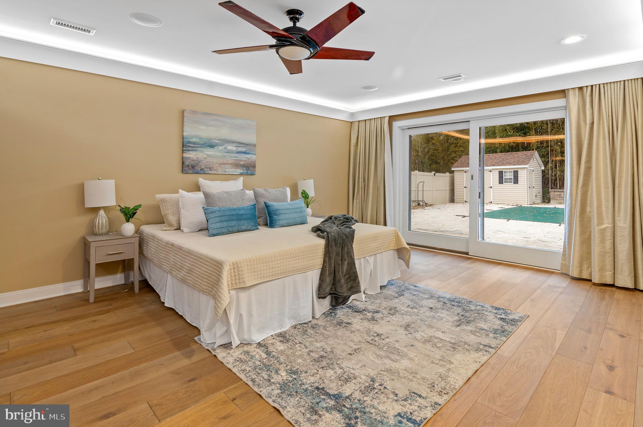 3521 Old Court Road Baltimore, MD 21208 - Photo 32 of 39 a living room with a bed furniture and next to a window